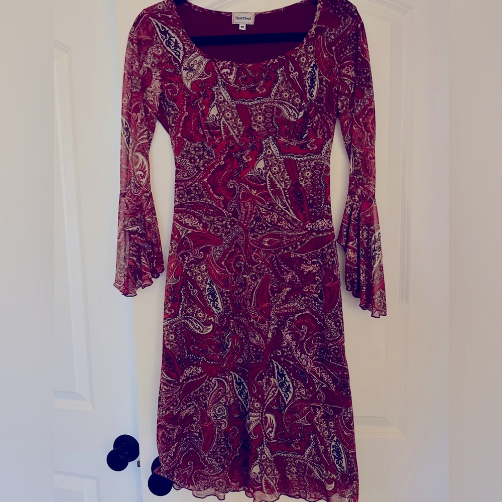 This one piece dress is in great condition size M made by HeartSoul.